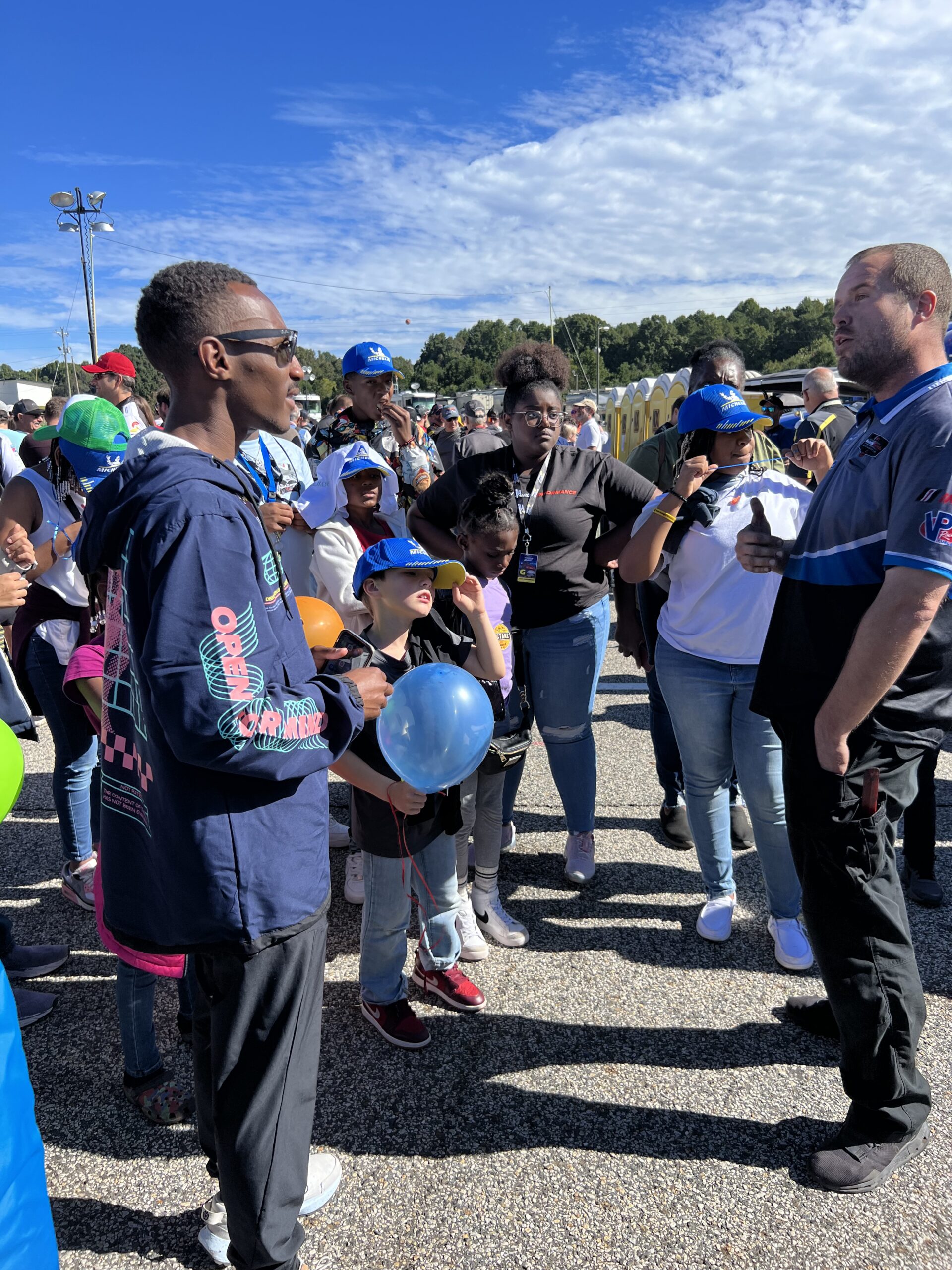 Speed Safari youth connecting with mentors during a motorsports experience